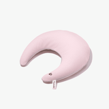Pink travel pillow with buckwheat hulls